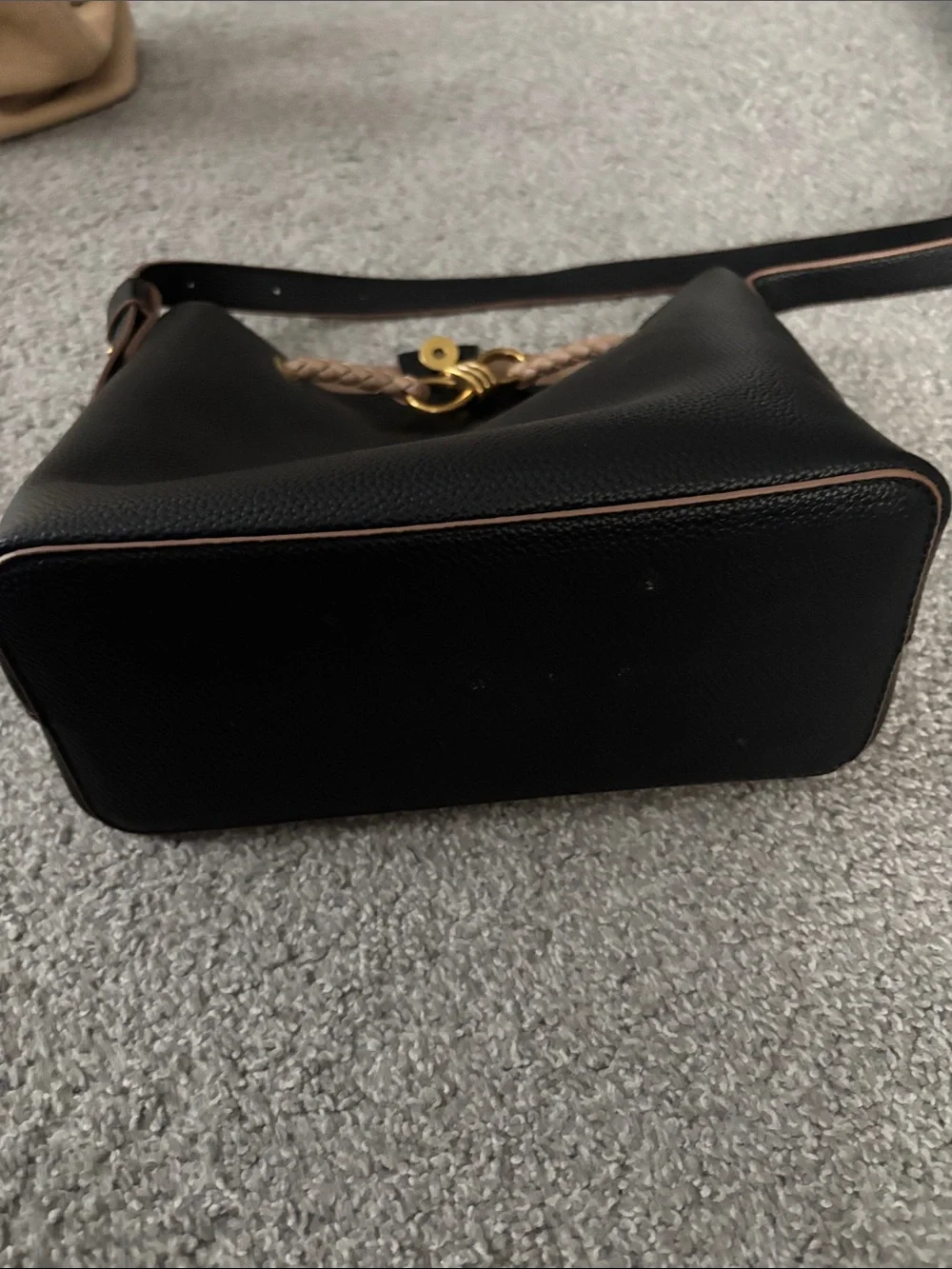 Black and Tan Leather Bucket Bag with Braided Accent